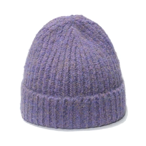 Knitted purple beanie with rib-knit texture and soft mohair finish for winter warmth