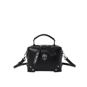 Chic black rivet leather crossbody bag with silver skull ornament and sturdy top handles