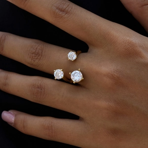 Asymmetric 16K gold plated stainless steel open ring with three sparkling white zircons