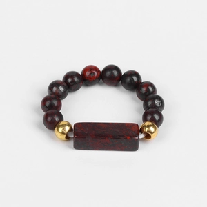 Elastic ring with 4mm bloodstone beads and rectangular center stone with gold accents