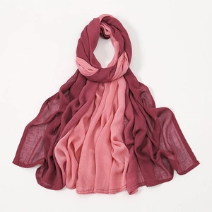 Detail of soft burgundy and pink gradient modal fabric with smooth edge stitching
