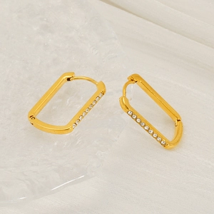 Minimalist gold U-shaped hoop earrings with sparkling zircon crystals for a modern luxury look