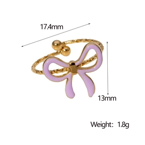 Detail shot of gold-plated bow ring showing 17.4mm width and 1.8g weight on white background