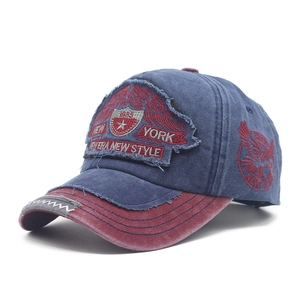 Vintage washed denim baseball cap with navy red contrast and New York shield embroidery