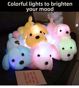 Lying plush puppy toys in four colors featuring internal LED light color-changing effects