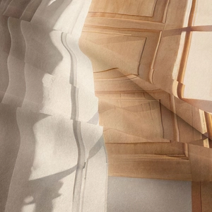 Macro shot of bohemian tapestry showing realistic wood grain print and soft fabric texture