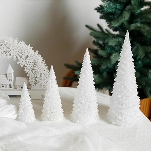 Set of four glowing acrylic Christmas trees with ice crystal texture for table decor