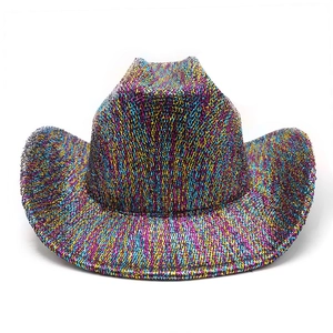 Macro shot of colorful glitter woven texture on wide brim western cowboy hat