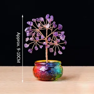 Natural amethyst crystal money tree with copper wire branches in a colorful glass pot