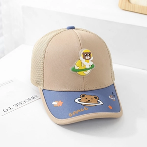 Detail of kids breathable mesh baseball cap featuring a 3D space bear badge on khaki front