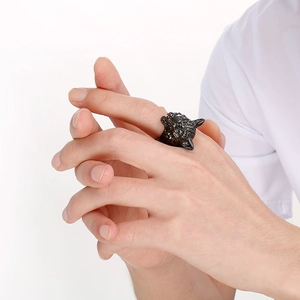 Detailed view of an antique punk Viking wolf head stainless steel ring for men in black