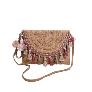Straw woven crossbody bag with colorful tassels for beach vacations and ethnic style fashion