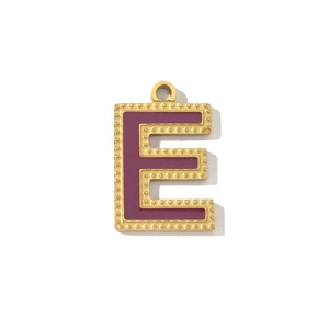 Detailed close-up of golden stainless steel 'E' letter pendant with purple enamel inlay