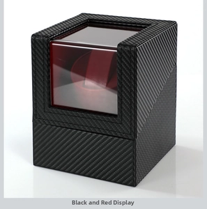 Detail of single watch winder in black carbon fiber leather with red interior lining