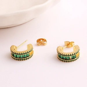 Elegant gold C-shaped hoop earrings featuring micro-pave green and clear cubic zirconia