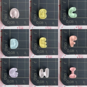 Mini resin alphabet charms with cat-eye effect for hair clips and DIY phone case crafts