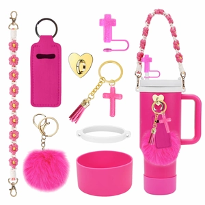 Pink Stanley tumbler accessory set with glitter cross straw cover and flower charm