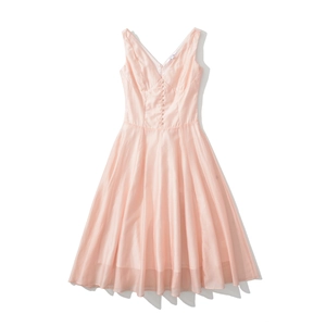 Detailed close-up of V-neckline with decorative buttons on a pink sleeveless dress