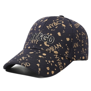 Navy blue baseball cap with gold splatter pattern and NY&GD 3D embroidery detail