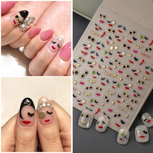 Detail of Co-335 nail stickers featuring red lips, high heels, and golden fashion elements