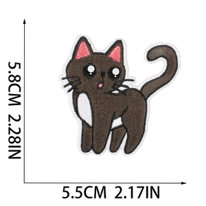 Close-up of a cartoon cat embroidery patch with precise size measurements in inches
