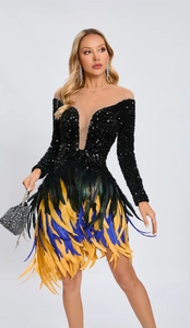 Detail of colorful ostrich feathers and sequins on a black elegant slim-fit evening dress