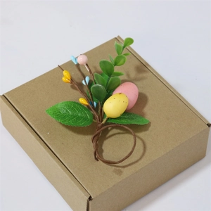 Detailed view of Easter egg napkin ring with eucalyptus leaves and colorful berries