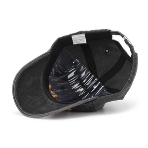 Detail of child's baseball cap interior stitching with metal buckle and cotton fabric