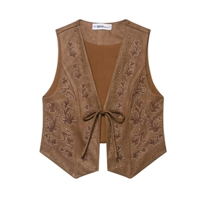 Brown faux suede V-neck vest with floral embroidery and metallic stud trim details
