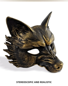 Detail of a stereoscopic wolf mask with realistic hand-painted gold texture for party