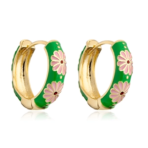 Detail of green enamel hoop earrings with pink daisy floral pattern and gold plating