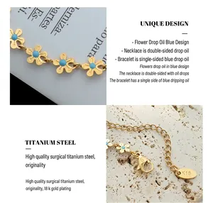 Detail of 18K gold plated floral pendant with blue enamel and lobster clasp closure