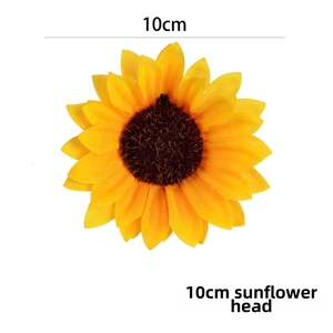 Detail view of a 10cm realistic artificial sunflower clip with yellow petals and brown center