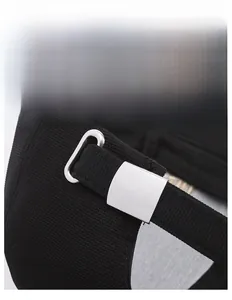 Detailed view of adjustable metal buckle and high-density twill fabric on black baseball cap
