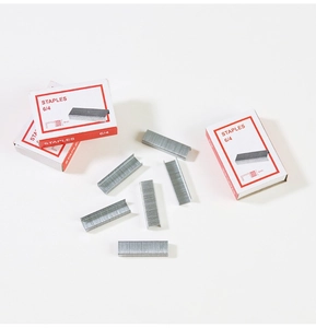 Detailed macro view of heavy-duty 6/4 galvanised steel staples for office stationery