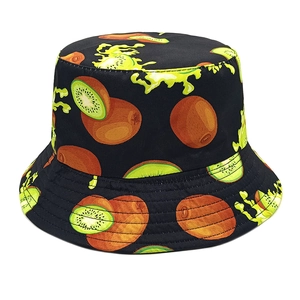 Macro shot of kiwi print on black bucket hat with reinforced brim stitching details