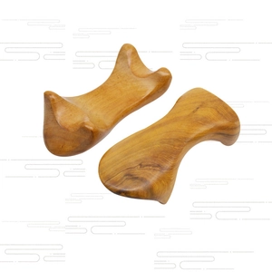 Natural Vietnamese sandalwood scraping massage tools with a smooth wooden grain finish