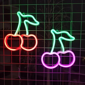 Dual-color LED cherry neon wall lights in red, green and purple on a white grid
