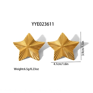 Detailed view of gold star stud earring measuring 3.9cm x 4.1cm with radial texture