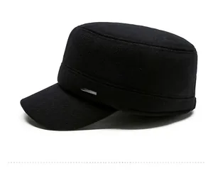 Detail of black wool cadet cap featuring a side view of the metallic Sports emblem