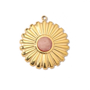Golden sunburst pendant with a round pink natural stone center in high-quality stainless steel