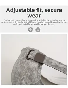 Detail of adjustable metal buckle and durable ripstop fabric on a grey baseball cap