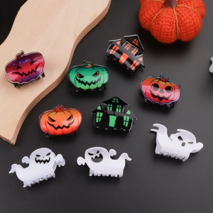 Halloween hair claw clip set featuring pumpkin ghost and haunted house designs