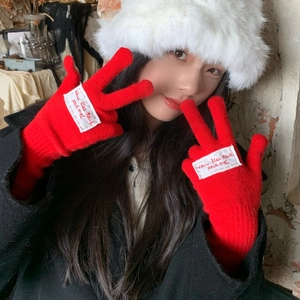 Thick red knitted winter gloves for women with touch screen fingers and embroidered label