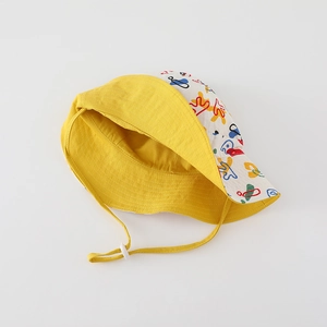 Detail of kids reversible sun hat with colorful graffiti print and adjustable chin strap