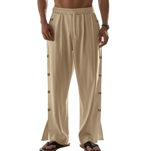Detail view of khaki linen trousers with side button placket and breathable fabric texture