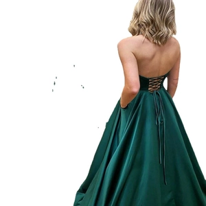 Elegant emerald green strapless satin evening gown with lace-up back and side pockets