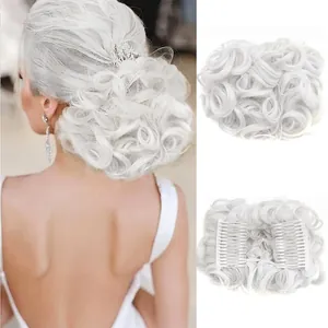 Detail view of curly white synthetic hair bun with dual side combs for bridal styling
