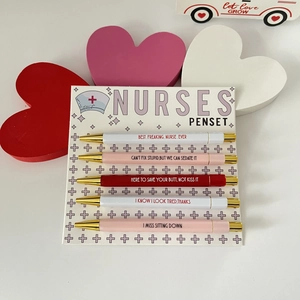 Close-up of nurse theme ballpoint pen set with funny English quotes on display card