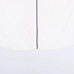 White poplin shirt featuring black contrast trim on front placket and curved hemline